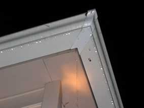 Water dripping down from the corner of the guttering