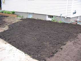Side yard with more topsoil spread