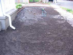 Saturated and rutted lawn after running traveling sprinkler