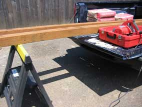 Long pressure-treated fence posts to be cut down