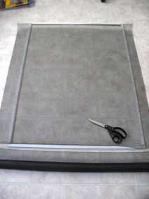 Screening material laid out over frame