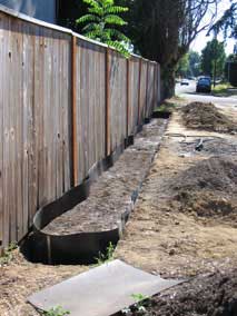 Trench partially filled and watered down