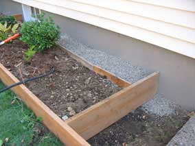 Planting bed with west end enclosed