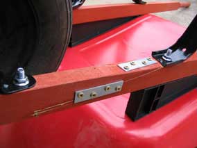 Wheelbarrow arm repaired with mending plates