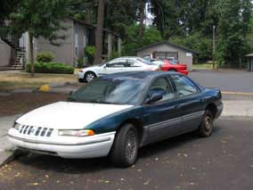 Probably-abandoned car next to my driveway