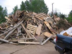 Most of the demolition wood removed from back room of basement