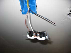 Neutral wire attached to silver screw on neutral side