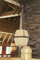 Rustic pendant lamp inside Timberline Lodge
