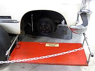 Louis Mattar's Cadillac - platform to change tires while in motion