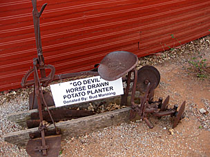 Horse-drawn potato planter at Arcadia Round Barn