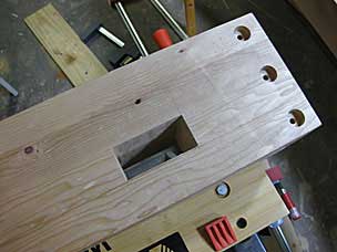 Through mortise for long stretcher
