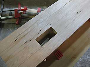 Through mortise for long stretcher