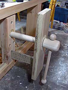 Sliding vise on workbench, mostly complete
