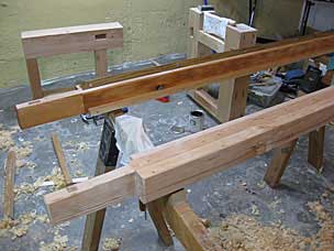 Applying first sealer coat of polymerized tung oil