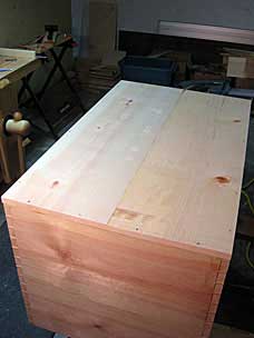 Tool chest floor panel nailed on