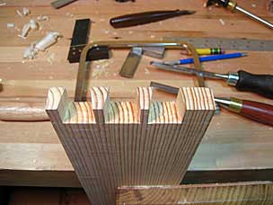 Dovetail pins on tool chest skirt board