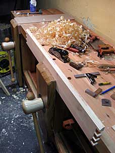 Tool chest long skirt board with dovetails pins and chamfered edge