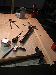 Tool chest with one short and one long skirt board in place