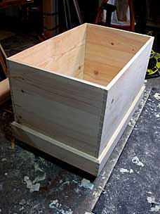 Tool chest with skirt and casters
