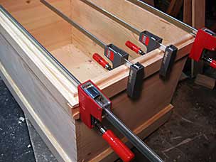 Tool chest dust seal glued, clamped, and nailed
