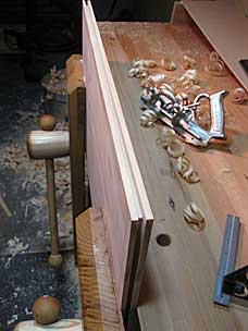 Grooves plowed in tool chest lid panel