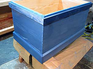 Adding a second coat of milk paint to tool chest