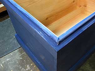 Touchup milk paint on tool chest