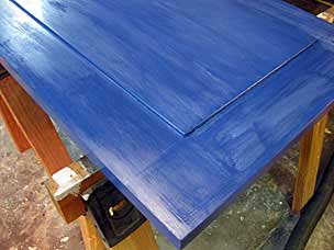 Tool chest lid with milk paint and polymerized tung oil