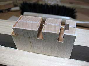 Finishing back dovetails in drawer sides