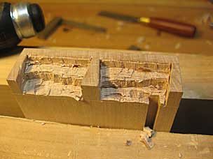 Chopping waste in half blind dovetails