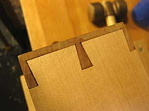 Drawer side with dovetail baselines reasonably tight