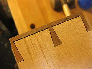 Drawer side with gappy dovetail baselines