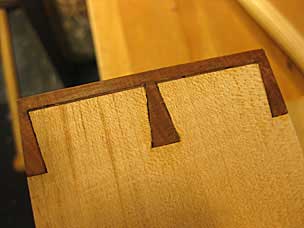 Drawer side with dovetail baseline gaps filled
