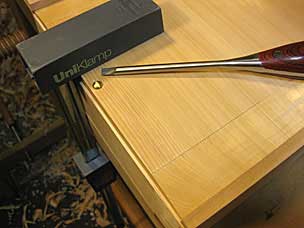 Drawer bottom attached with screw