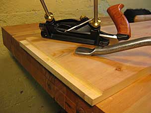 Rebate or rabbet or fillester across end of board