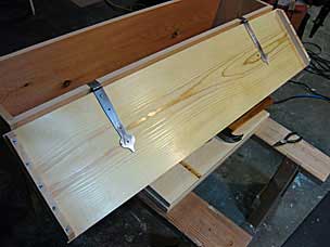 Installing strap hinges on six board chest