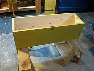Boarded chest sides nailed together, ready for lid