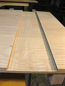 Sliding dovetail slot for batten