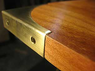 Brass cornerguard installed in top