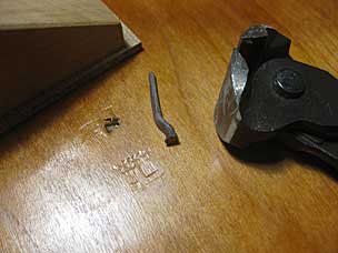 Bent nail after prying it out of the top