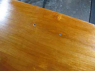 After spot refinishing area with shellac blushing